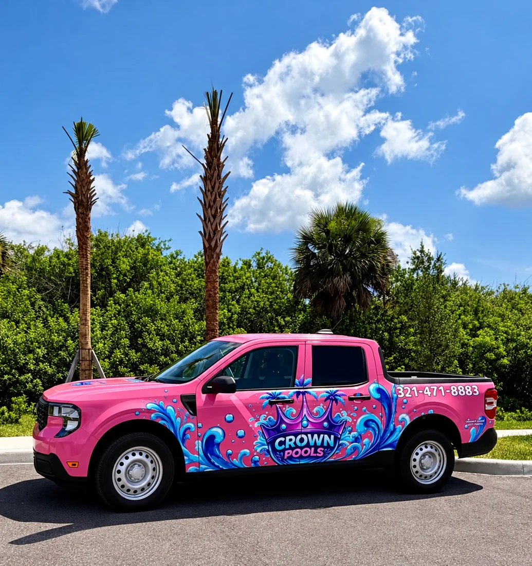 Crown Pools pink service truck with blue water graphics
